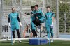 FILE - Real Madrid's goalkeeper Thibaut Courtois, 3rd left trains watched by reserve goalkeeper Andriy Lunin, left, during a Media Opining day training session in Madrid, Spain, on May 24, 2022. Real Madrid coach Carlo Ancelotti has started his casting for which goalkeeper – Thibaut Courtois or Andriy Lunin – will start the Champions League final. Ancelotti said Friday May 10, 2024 that he had one month “to think about it.