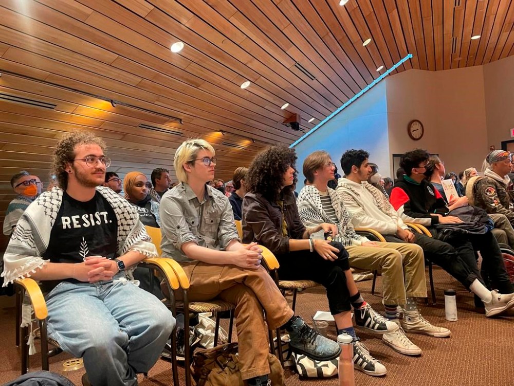 Pro-Palestinian supporters attended a University of Minnesota's Board of Regents meeting on Friday, May 10, 2024, in Minneapolis to demand divestment from companies that profit off the Israel-Hamas war. The University of Minnesota disclosed this week that about $5 million of its $2.27 billion endowment investments — or less than a quarter of 1% — are tied to Israeli companies or U.S. defense contractors. (AP Photo/Trisha Ahmed)