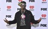 FILE - Flavor Flav arrives at the iHeartRadio Music Awards on Monday, April 1, 2024, in Los Angeles. Maggie Steffens asked for more support for the U.S. women's water polo team, and the captain received one particularly surprising response. From a clock-wearing rap icon.(Photo by Jordan Strauss/Invision/AP, File)