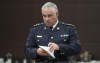 Acting RCMP Commissioner Mike Duheme waits to appear before the Procedure and House Affairs committee, in Ottawa, Tuesday, June 13, 2023. THE CANADIAN PRESS/Adrian Wyld