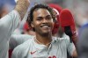 Philadelphia Phillies' Cristian Pache is congratulated by teammates after he and Edmundo Sosa scored on a single by Kyle Schwarber during the fourth inning of a baseball game against the Miami Marlins, Friday, May 10, 2024, in Miami. (AP Photo/Wilfredo Lee)