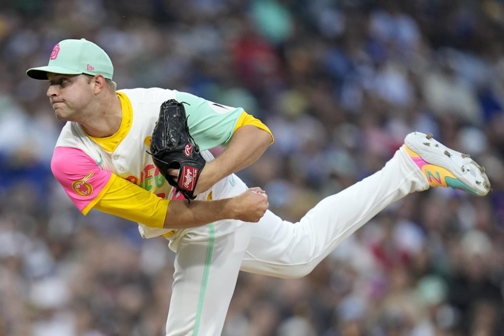 San Diego Padres starting pitcher Michael King works against a Los Angeles Dodgers batter during the third inning of a baseball game, Friday, May 10, 2024, in San Diego. (AP Photo/Gregory Bull)