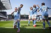Manchester City's Phil Foden, left, celebrates with teammates after scoring his side's second goal during the English Premier League soccer match between Fulham and Manchester City at the Craven Cottage Stadium in London, Saturday, May 11, 2024. (AP Photo/Kirsty Wigglesworth)