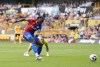 Crystal Palace's Eberechi Eze scores his sides third goal of the gamel during the English Premier League soccer match between Wolverhampton Wanderers and Crystal Palace, at Molineux, Wolverhampton, England, Saturday May 11, 2024. (Nick Potts/PA via AP)