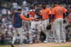 Houston Astros manager Joe Espada takes the ball from pitcher Cristian Javier (53) against the Detroit Tigers in the second inning of a baseball game, Saturday, May 11, 2024, in Detroit. (AP Photo/Paul Sancya)