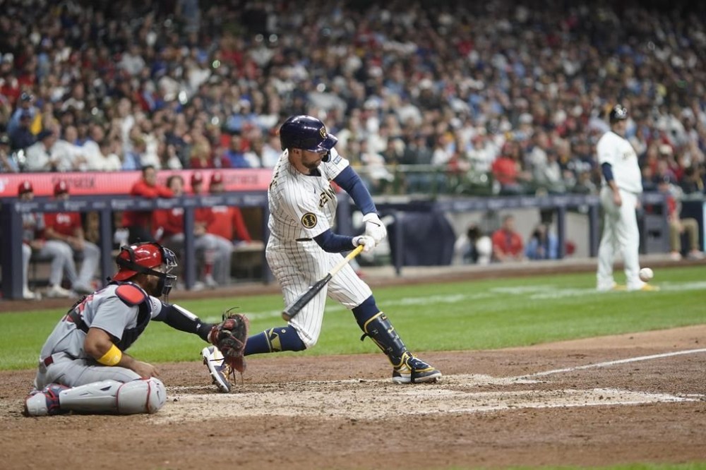 Milwaukee Brewers' Rhys Hoskins hits a three run home run during the seventh inning of a baseball game against the St. Louis Cardinals Saturday, May 11, 2024, in Milwaukee. (AP Photo/Morry Gash)