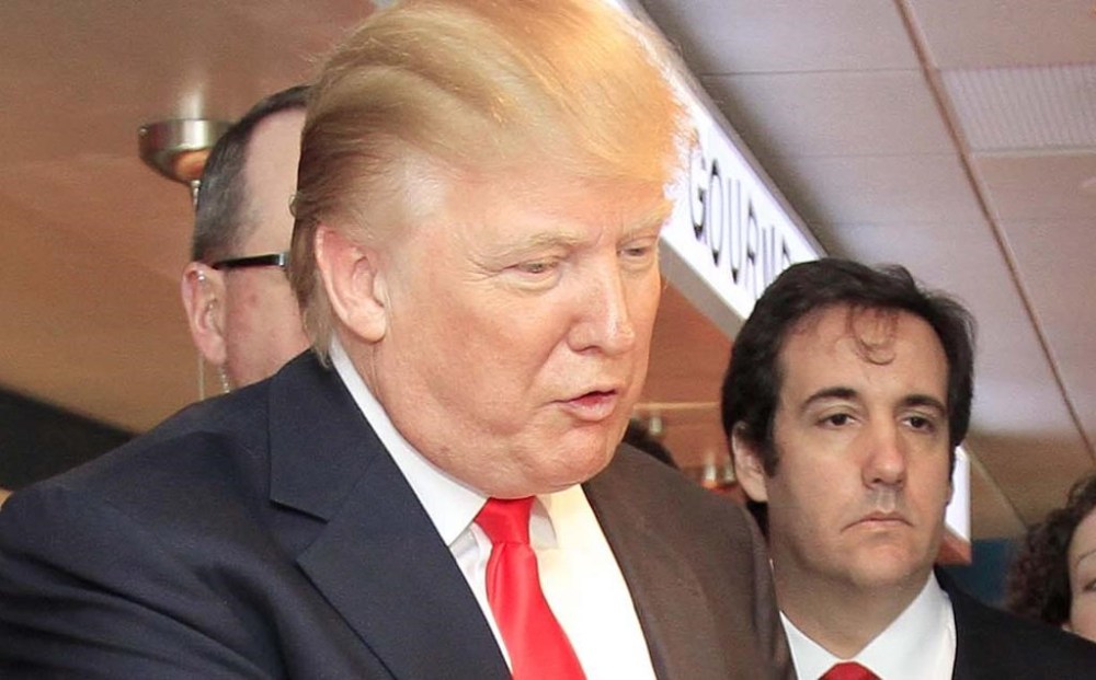 Donald Trump, left, a possible 2012 presidential candidate, left, and attorney Michael Cohen, are pictured at a stop at the Roundabout Diner, April 27, 2011, in Portsmouth, N.H. Cohen is prosecutors’ most central witness in former President Donald Trump's hush money trial. But Trump’s fixer-turned-foe is also as challenging a star witness as they come. The now-disbarred lawyer has a tortured history with Trump. (AP Photo/Jim Cole)