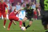 Bayern's Lovro Zvonarek, left, challenges for the ball with Wolfsburg's Jakub Kaminski during the German Bundesliga soccer match between Bayern Munich and VfL Wolfsburg at the Allianz Arena in Munich, Germany, Sunday, May 12, 2024. (AP Photo/Matthias Schrader)