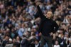 Manchester City's head coach Pep Guardiola gestures during the English Premier League soccer match between Manchester City and Wolverhampton Wanderers at the Etihad Stadium in Manchester, England, Saturday, May 4, 2024. (AP Photo/Dave Thompson)