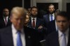 American author and politician J. D. Vance (C) watches as former President Donald Trump speaks to reporters with his lawyer Todd Blanche at Manhattan criminal court, Monday, May 13, 2024, in New York. (Sarah Yenesel/Pool Photo via AP)