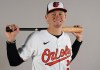 FILE - Kyle Stowers of the Baltimore Orioles baseball team posed in Sarasota, Fla., Feb. 21, 2024. Stowers was sent down after Baltimore's Mother's Day game last year. This year he found out on the holiday he was coming back to the majors. (AP Photo/Gerald Herbert, File)