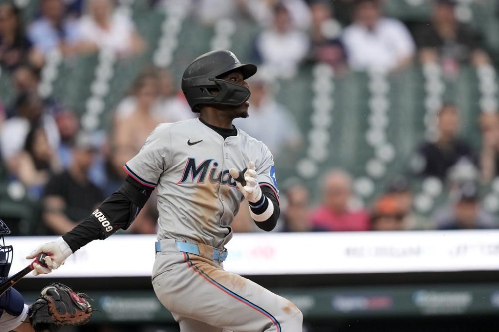 Miami Marlins' Nick Gordon hits a single to second during the fourth inning of a baseball game against the Detroit Tigers, Monday, May 13, 2024, in Detroit. (AP Photo/Carlos Osorio)