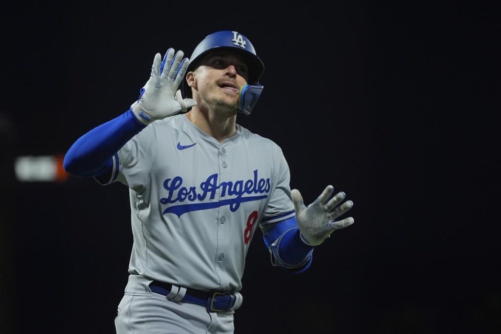 Los Angeles Dodgers' Enrique Hernández celebrates after hitting a solo home run against the San Francisco Giants during the seventh inning of a baseball game Monday, May 13, 2024, in San Francisco. (AP Photo/Godofredo A. Vásquez)