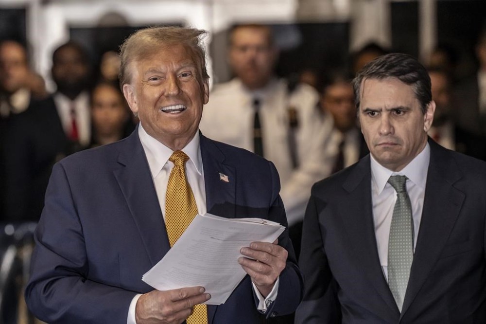 Former President Donald Trump speaks to the media outside Manhattan criminal court before his trial in New York, Tuesday, May 14, 2024. (Mark Peterson/Pool Photo via AP)