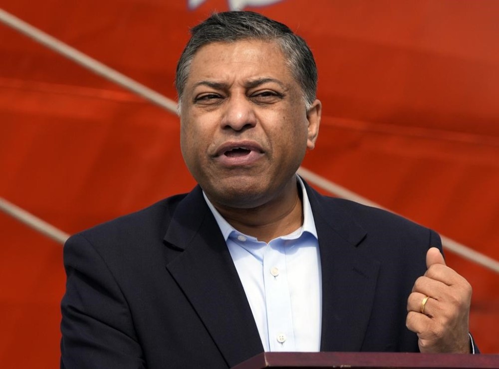 FILE - Dr. Rahul Gupta, head of the White House's Office of National Drug Control Policy, speaks during a press conference Thursday, Feb. 17, 2022, at Port Everglades in Fort Lauderdale, Fla. The U.S. drug czar, who holds a position on the World Anti-Doping Agency's executive committee, sent a pointed letter to world anti-doping officials, saying leaders in governments across the globe “remain deeply concerned” about the response to allegations of Chinese doping before the Tokyo Olympics in 2021. (AP Photo/Rebecca Blackwell, File)