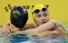 Summer McIntosh hugs Julie Brousseau after winning the women's 200m freestyle at the Canadian Olympic Swim Trials in Toronto on Tuesday May 14, 2024. THE CANADIAN PRESS/Frank Gunn