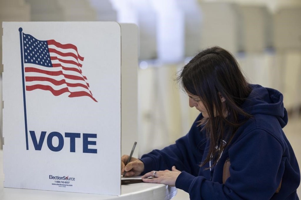 Laura Howard casts a ballot on Tuesday, May 14, 2024, in Waverly, Neb. (Katy Cowell/Lincoln Journal Star via AP)