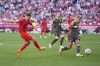 Bayern's Lovro Zvonarek scores his side's opening goal during the German Bundesliga soccer match between Bayern Munich and VfL Wolfsburg at the Allianz Arena in Munich, Germany, Sunday, May 12, 2024. (AP Photo/Matthias Schrader)