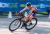 FILE - Taylor Knibb, of the United States, rides in the women's elite category of the ITU World Triathlon Series in Edmonton, Alberta, Friday, July 27, 2018. Knibb, an Olympic triathlete, won the women's time trial at the U.S. road cycling championships Wednesday, May 15, 2024, securing her spot on the American team and presenting her with a chance to compete in two different sports at the Paris Games. (Jason Franson/The Canadian Press via AP, File)