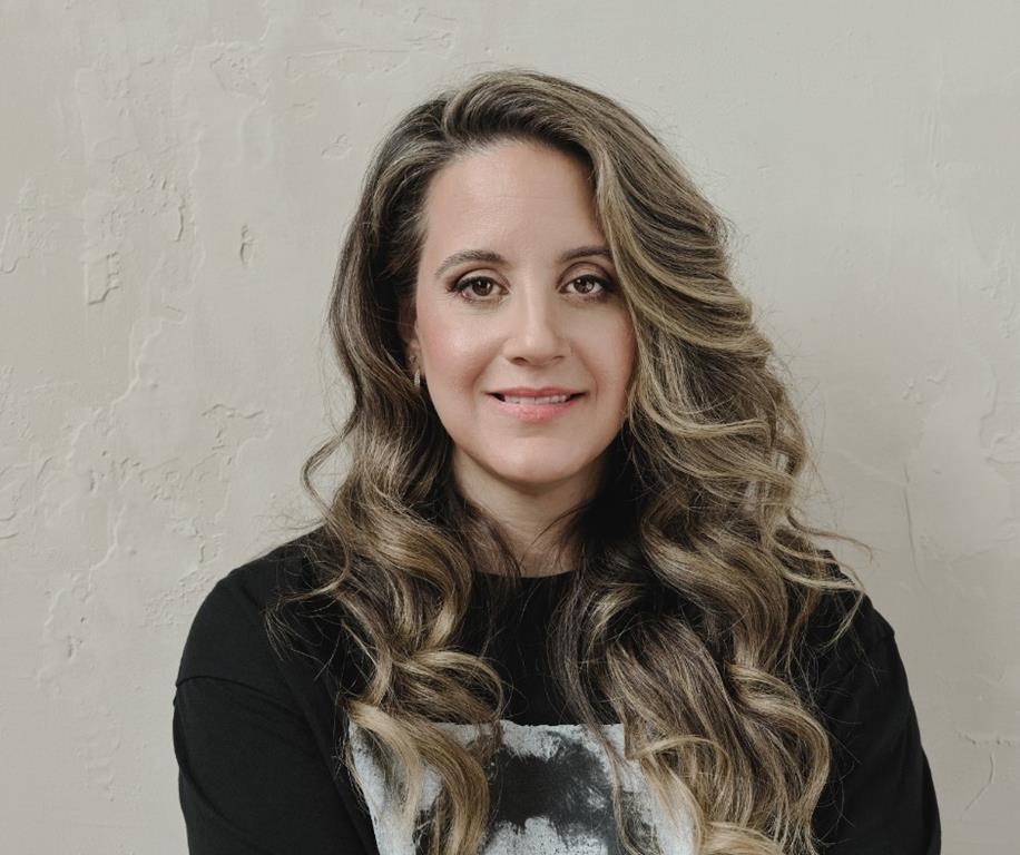 Stefanie Ricchio, shown in a handout photo, who works remotely as a chartered professional accountant, is an avid traveller. She says being flexible toward dates and destination help find better deals when planning a budget vacation. THE CANADIAN PRESS/HO-Samuel Engelking **MANDATORY CREDIT**