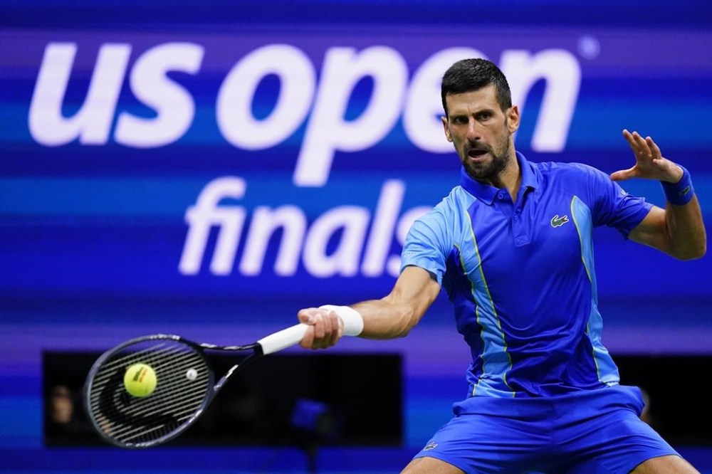 Novak Djokovic, of Serbia, returns a shot to Daniil Medvedev, of Russia, during the men's singles final of the U.S. Open tennis championships, Sunday, Sept. 10, 2023, in New York. : The U.S. Open men’s final will shift to ABC from ESPN this year — but the women’s title match will remain on the cable outlet a year after Coco Gauff won the Grand Slam tennis tournament. This will be the first time ABC airs the men's final, ESPN said Wednesday, May 15, 2024. (AP Photo/Frank Franklin II, File)