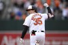 Baltimore Orioles' Adley Rutschman celebrates his walk-off two-run home run as he rounds the bases in the ninth inning of a baseball game against the Toronto Blue Jays, Wednesday, May 15, 2024, in Baltimore. The home run was reviewed and upheld. The Orioles won 3-2. (AP Photo/Nick Wass)