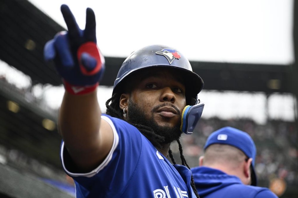 Toronto Blue Jays' Vladimir Guerrero Jr. gestures to a fan before a baseball game against the Baltimore Orioles, Wednesday, May 15, 2024, in Baltimore. (AP Photo/Nick Wass)