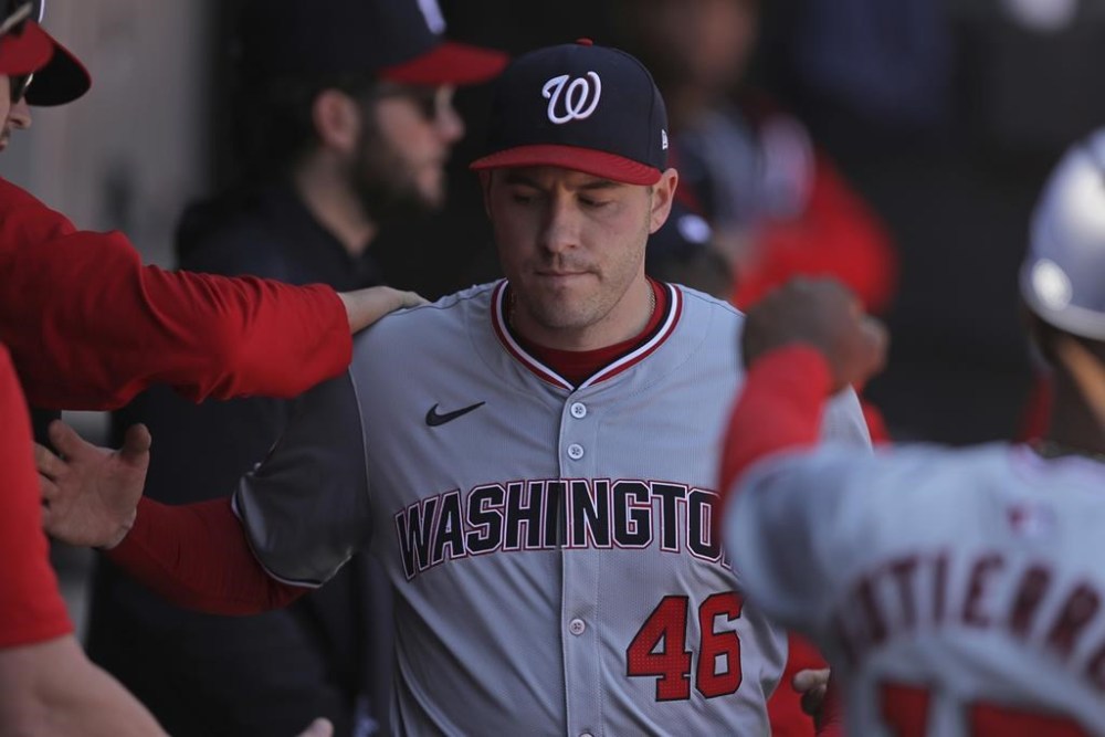Washington Nationals pitcher Patrick Corbin is greeted in the dugout during the sixth inning of a baseball game against the Chicago White Sox, Wednesday, May 15, 2024, in Chicago. (AP Photo/Melissa Tamez)