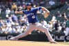 Kansas City Royals starting pitcher Alec Marsh throws during the first inning of a baseball game against the Seattle Mariners, Wednesday, May 15, 2024, in Seattle. (AP Photo/Jason Redmond)