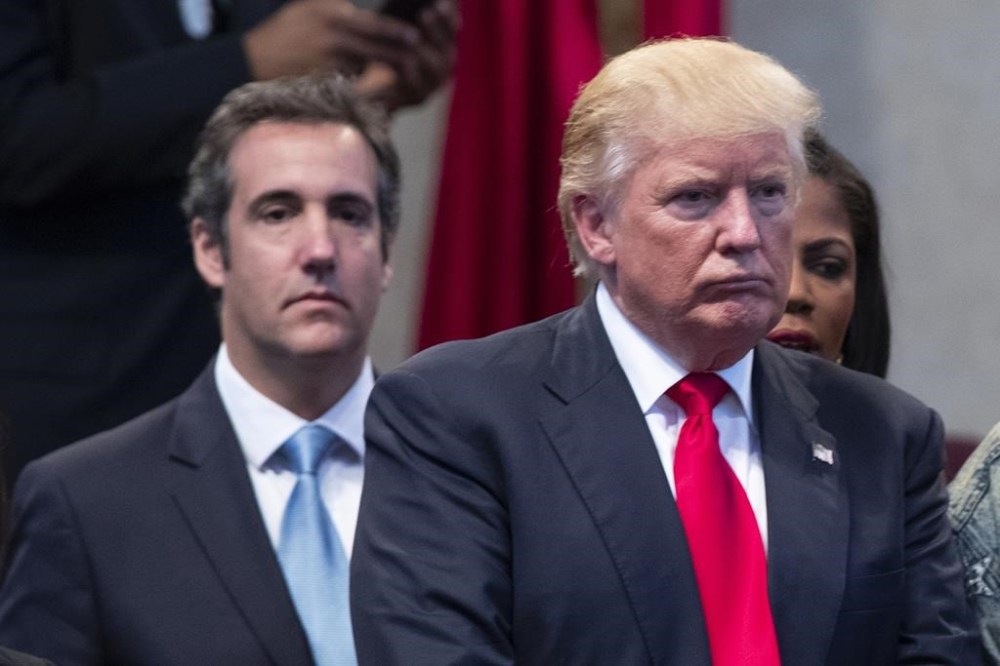 FILE- Republican presidential candidate Donald Trump, right, and attorney Michael Cohen, left, during a visit to the Pastors Leadership Conference at New Spirit Revival Center, Sept. 21, 2016, in Cleveland. Donald Trump’s fixer-turned-foe Michael Cohen returned to the witness stand Tuesday, testifying in detail how former president was linked to all aspects of a hush money scheme that prosecutors say was aimed at stifling stories that threatened his 2016 campaign. Trump is the first former U.S. president to go on trial. (AP Photo/ Evan Vucci, File)