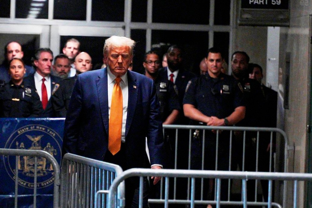 Former President Donald Trump arrives for talking to the media outside Manhattan criminal court in New York, on Tuesday, May 14, 2024. (Curtis Means/Pool Photo via AP)