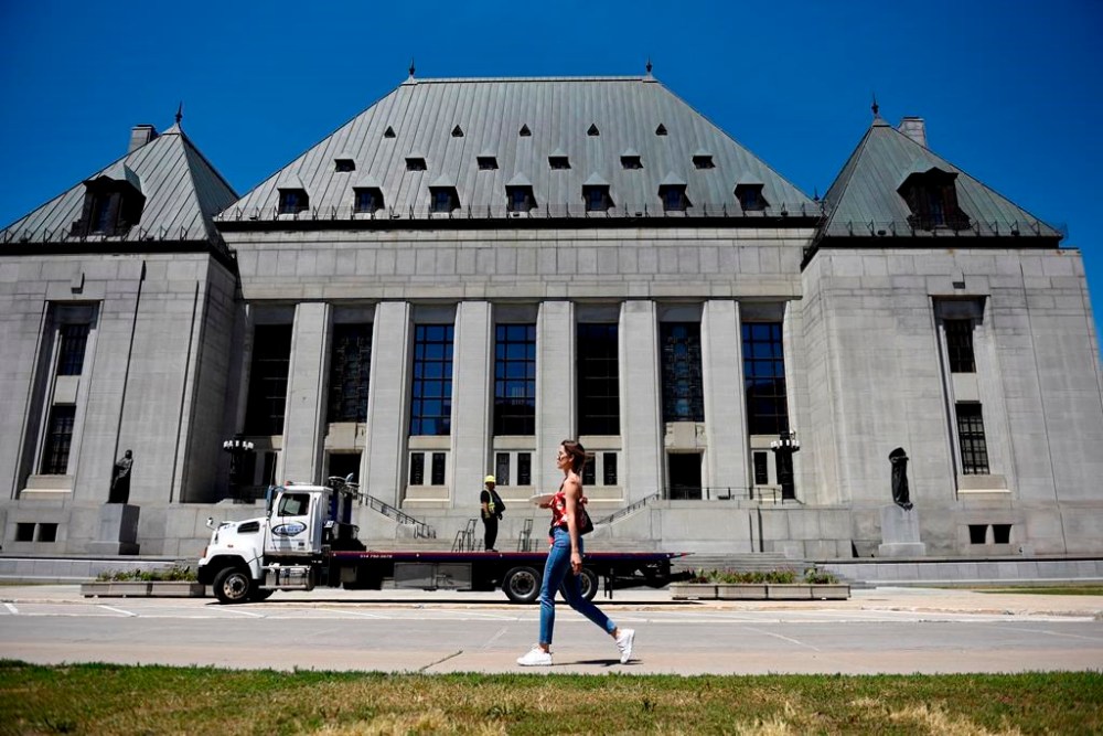 The Supreme Court of Canada has dismissed a bid by the City of Saint John to overturn a lower court ruling that found the city vicariously liable for the sexual abuse of children by a member of the Saint John Police Force. The Supreme Court of Canada building is seen in Ottawa, on Thursday, June 17, 2021. THE CANADIAN PRESS/Justin Tang