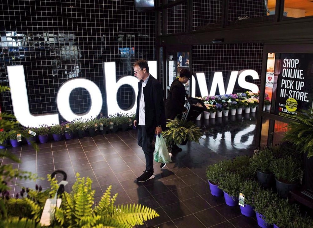 As a month-long boycott of Loblaw-owned stores wears on, small independent stores and alternative grocery options say they’re seeing a boost in traffic and sales. A man walks out through the entrance of a Loblaws store in Toronto on Thursday, May 3, 2018. THE CANADIAN PRESS/Nathan Denette