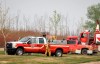 Fire-fighting personnel arrive in the evacuated neighbourhood of Beacon Hill in Fort McMurray, Alta., on Wednesday, May 15, 2024. THE CANADIAN PRESS/Jeff McIntosh