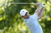 Rory McIlroy, of Northern Ireland, watches his tee shot on the 11th hole during the first round of the PGA Championship golf tournament at the Valhalla Golf Club, Thursday, May 16, 2024, in Louisville, Ky. (AP Photo/Jeff Roberson)
