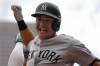 New York Yankees' Anthony Volpe celebrates his solo home run against the Minnesota Twins in the first inning of a baseball game Thursday, May 16, 2024, in Minneapolis. (AP Photo/Bruce Kluckhohn)