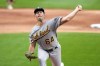 FILE - Oakland Athletics starting pitcher Ken Waldichuk delivers during the first inning of the team's baseball game against the Chicago White Sox on Aug. 24, 2023, in Chicago. Waldichuk had reconstructive surgery on his troublesome pitching elbow and will be sidelined all season, another tough injury blow for the pitcher this past year. (AP Photo/Charles Rex Arbogast, File)