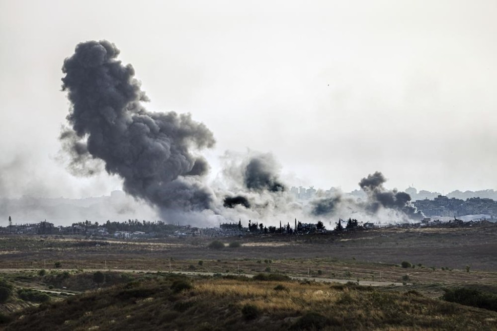 Smoke rises following an Israeli airstrike in the Gaza Strip, as seen from southern Israel, Friday, May 17, 2024. (AP Photo/Tsafrir Abayov)