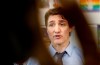 Prime Minister Justin Trudeau says some immigrants to Canada who lack official status need a pathway to help them stay, while in other cases Ottawa must speed up deportation procedures. Prime Minister Justin Trudeau responds to media during an announcement at Elwick Community School in Winnipeg, Friday, May 17, 2024. THE CANADIAN PRESS/John Woods