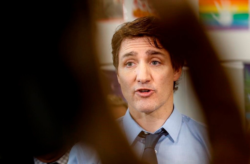 Prime Minister Justin Trudeau says some immigrants to Canada who lack official status need a pathway to help them stay, while in other cases Ottawa must speed up deportation procedures. Prime Minister Justin Trudeau responds to media during an announcement at Elwick Community School in Winnipeg, Friday, May 17, 2024. THE CANADIAN PRESS/John Woods