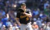 Pittsburgh Pirates starting pitcher Paul Skenes gets the ball back between batters the first inning of a baseball game against the Chicago Cubs Friday, May 17, 2024, in Chicago. (AP Photo/Charles Rex Arbogast)