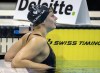 Penny Oleksiak leans on the side of the pool following the women's 200m freestyle at the Canadian Olympic Swim Trials in Toronto on Tuesday May 14, 2024. THE CANADIAN PRESS/Frank Gunn