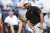 Jon Rahm, of Spain, reacts after missing a putt on the seventh hole during the first round of the PGA Championship golf tournament at the Valhalla Golf Club, Thursday, May 16, 2024, in Louisville, Ky. (AP Photo/Sue Ogrocki)