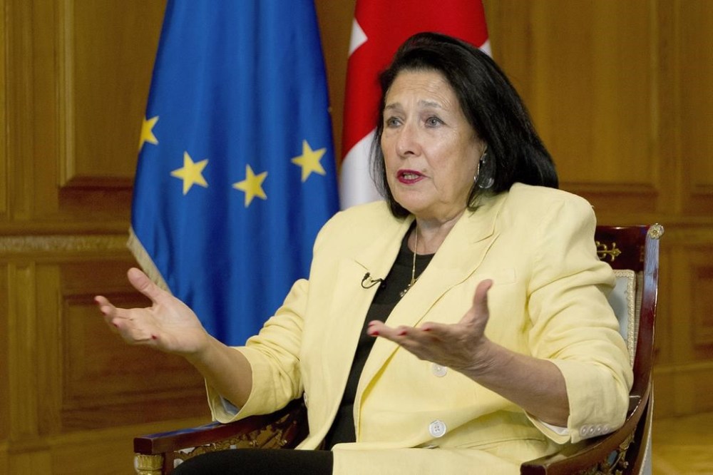 Georgian President Salome Zourabichvili gestures while speaking during an interview with The Associated Press, in Tbilisi, Georgia, Thursday, May 16, 2024. Zourabichvili said Thursday that a