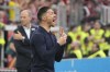 Leverkusen's head coach Xabi Alonso shouts to his players from the sideline during the German Bundesliga soccer match between Bayer Leverkusen and FC Augsburg at the BayArena in Leverkusen, Germany, Saturday, May 18, 2024. (AP Photo/Martin Meissner)