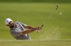 Scottie Scheffler hits from the bunker on the seventh hole during the third round of the PGA Championship golf tournament at the Valhalla Golf Club, Saturday, May 18, 2024, in Louisville, Ky. (AP Photo/Jeff Roberson)