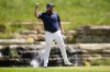 Shane Lowry, of Ireland, celebrates after a birdie on the 13th hole during the third round of the PGA Championship golf tournament at the Valhalla Golf Club, Saturday, May 18, 2024, in Louisville, Ky. (AP Photo/Matt York)