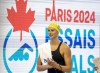 Summer McIntosh smiles as she walks off the pool deck after winning the women's 400m freestyle at the Canadian Olympic Swim Trials in Toronto on Monday May 13, 2024. THE CANADIAN PRESS/Frank Gunn