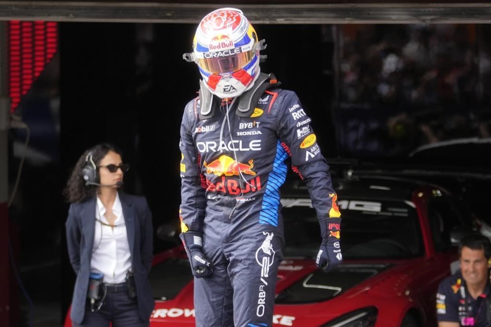 Red Bull driver Max Verstappen of the Netherlands celebrates after winning the Italy's Emilia Romagna Formula One Grand Prix race at the Dino and Enzo Ferrari racetrack in Imola, Italy, Sunday, May 19, 2024. (AP Photo/Luca Bruno)
