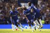 Chelsea's Moises Caicedo, centre, celebrates after scoring their side's first goal of the game from the half-way line during the Premier League match between Chelsea FC and AFC Bournemouth at Stamford Bridge, London, Sunday May 19, 2024. (Bradley Collyer/PA via AP)